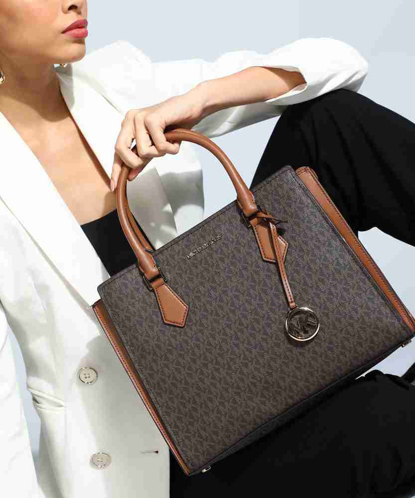 Buy MICHAEL KORS Women Brown Hand held Bag 200 Online Best Price in India Flipkart