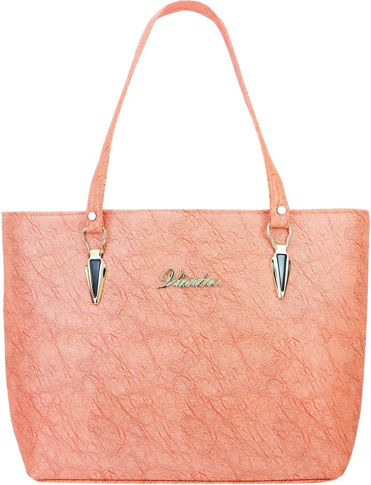 Peach color handbags outlet online