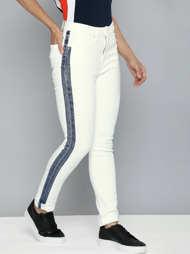 White jeans with stripe cheap on side