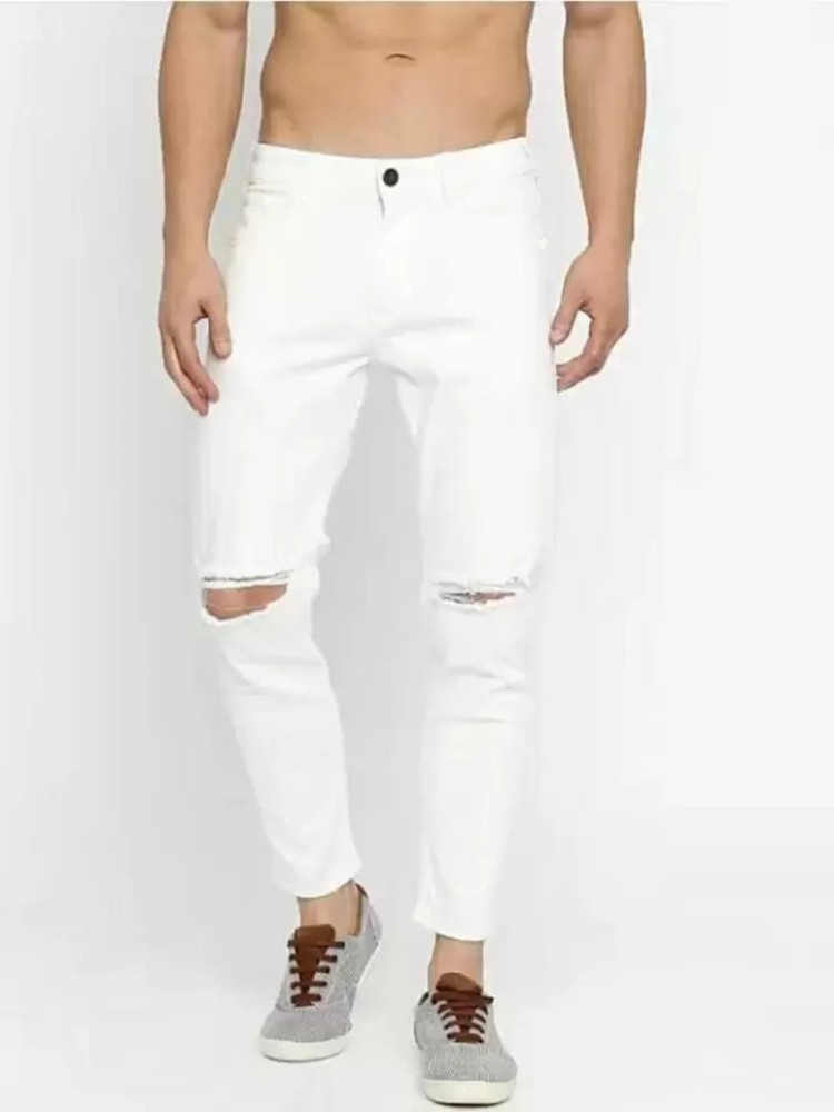 White jeans cut store knees