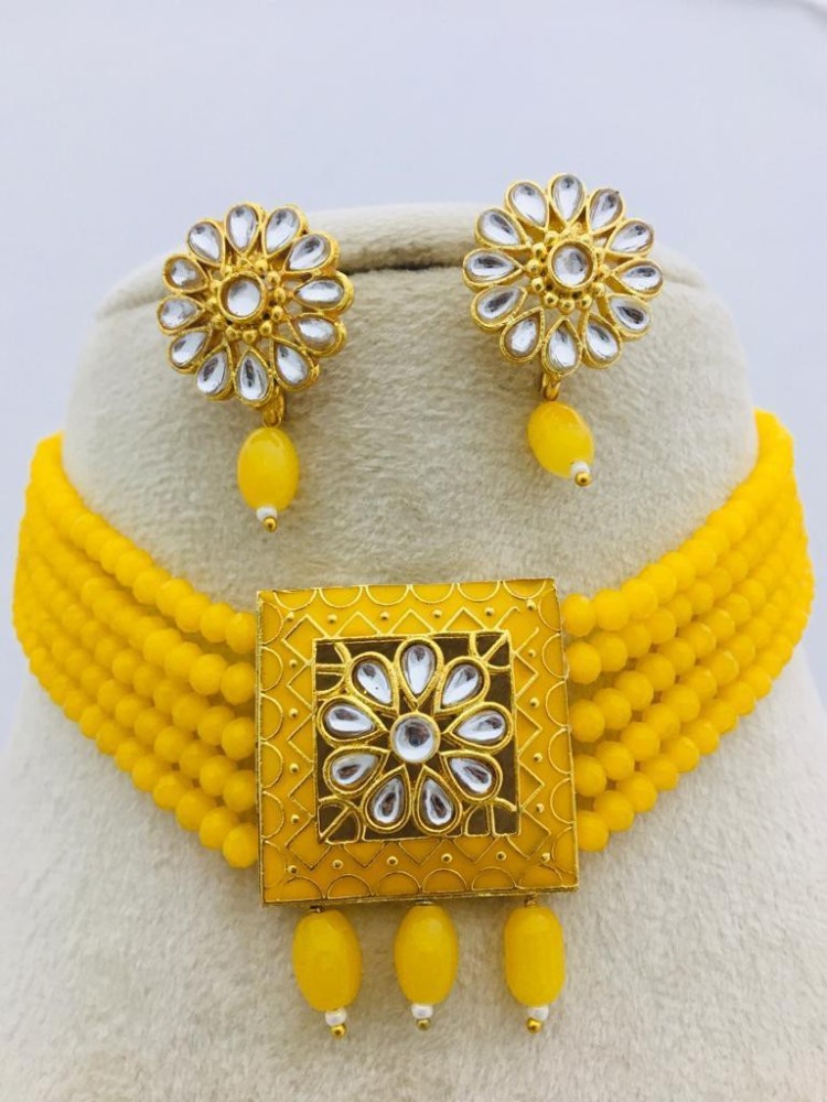 ABP jewels Brass Gold plated Yellow Jewellery Set Price in India