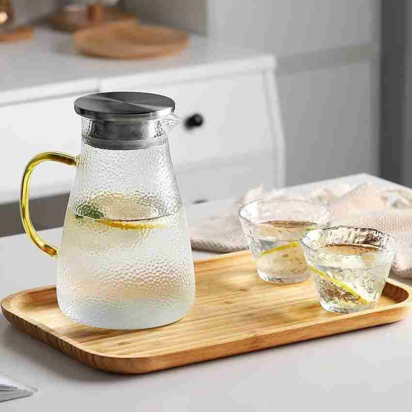 https://rukminim2.flixcart.com/image/850/1000/xif0q/jug/b/f/p/borosilicate-glass-water-jug-with-lid-and-golden-handle-juice-original-imaggyucgu2tv3hc.jpeg?q=20