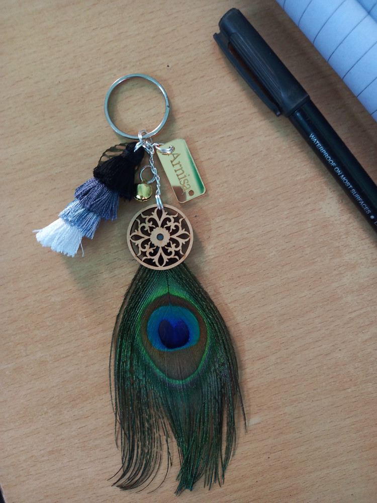 Arnisa peacock feather and layered tassel keyring for positive
