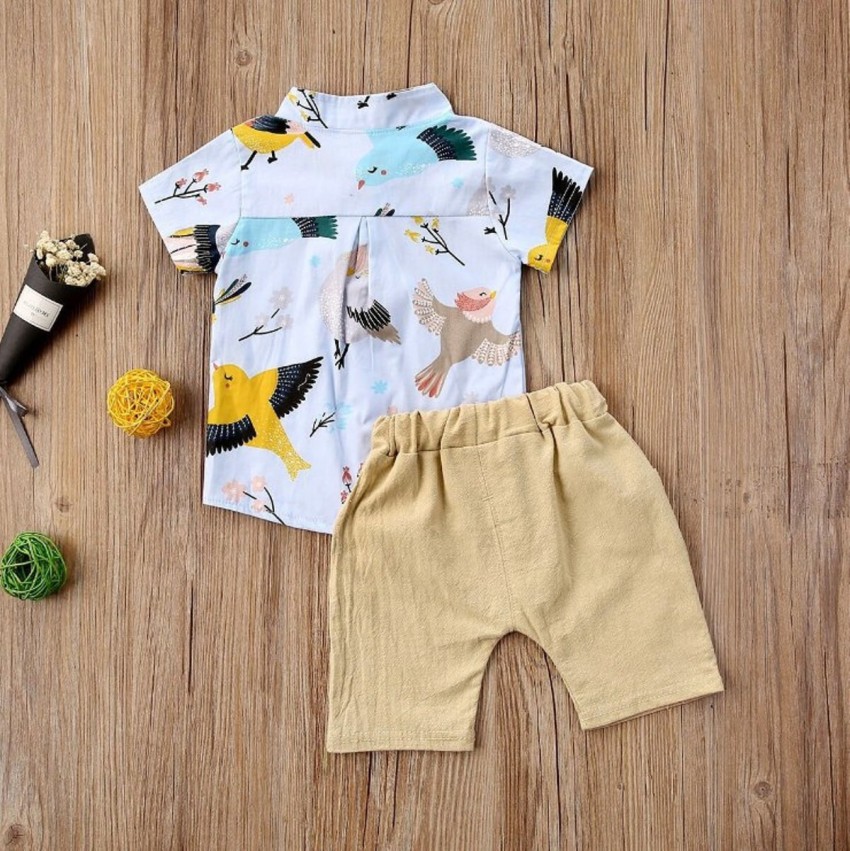 Baby boy casual shorts Toddler boy brand textile short pants on yellow  wooden background Dark blue kids shorts Stock Photo  Alamy