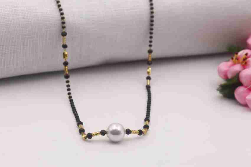 ELIVOR FASHION WHITE MOTI GOLD PARO MANGALSUTRA 600 Alloy Mangalsutra Price in India Buy ELIVOR FASHION WHITE MOTI GOLD PARO MANGALSUTRA 600 Alloy Mangalsutra Online at Best Prices in India Flipkart.c...