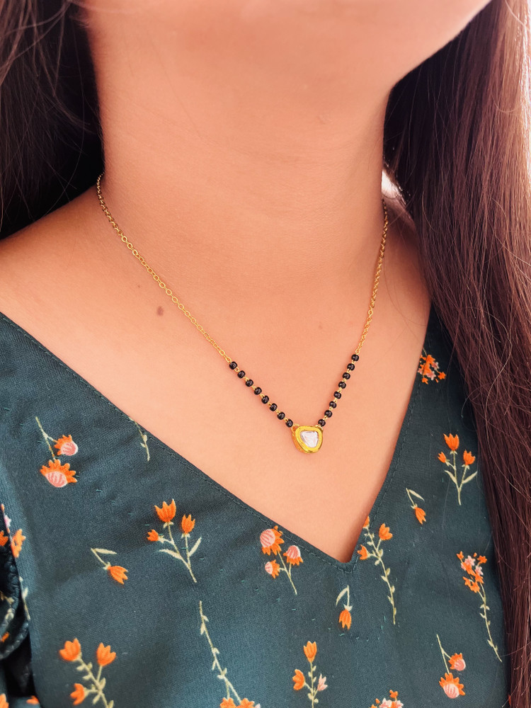 Single stone mangalsutra in gold cheap