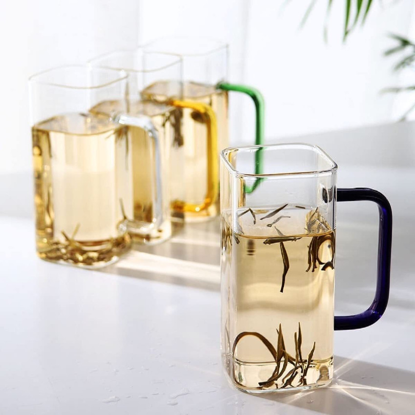 Glass cup with shop handle