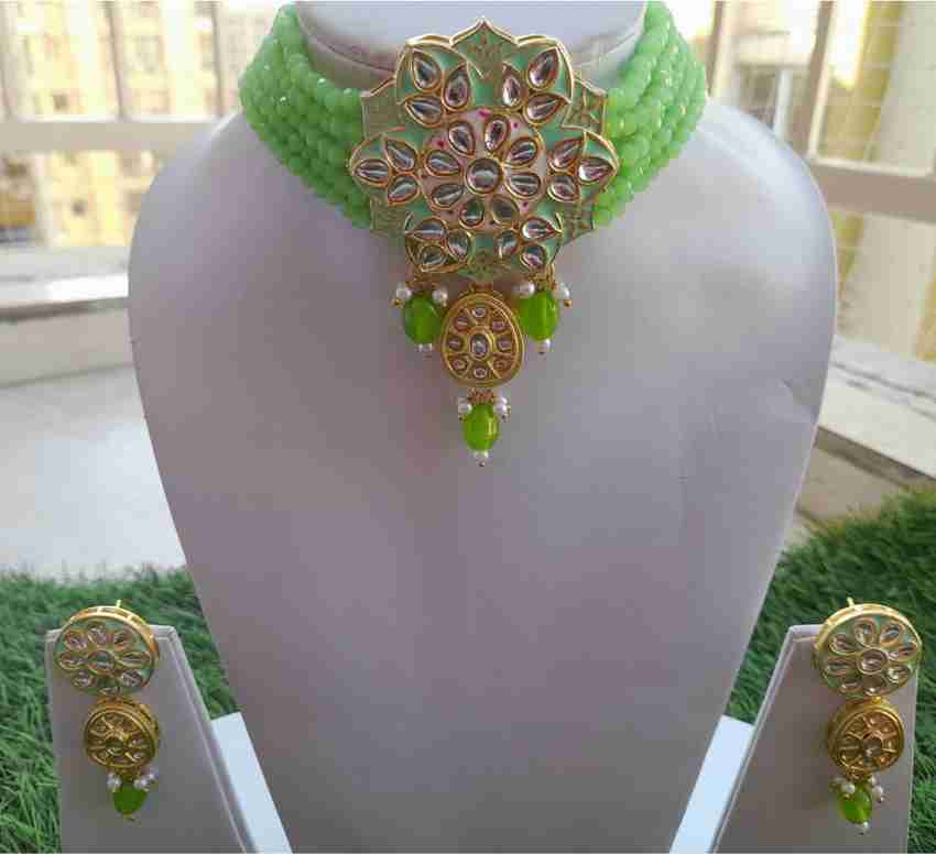 Artificial jewellery in green colour on sale