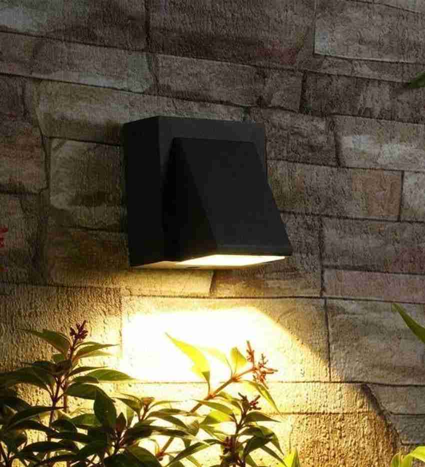 Waterproof outlet wall light