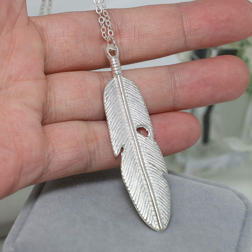 Silver feather outlet pendant necklace