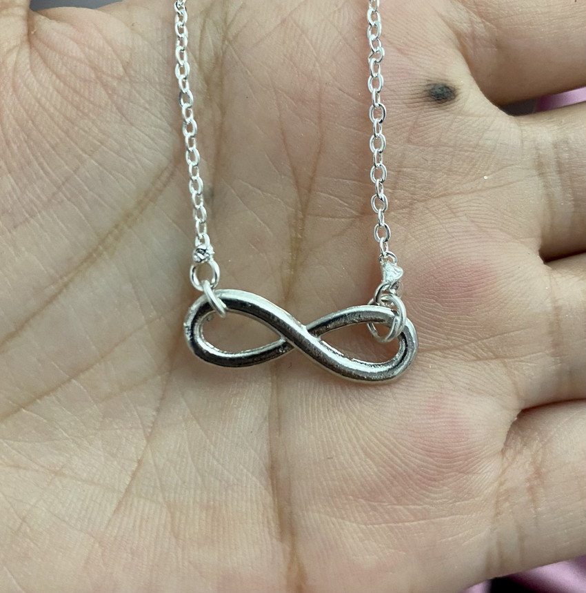 Oralia Silver Infinity Charm Necklace Dailywear Infinity Affordable Jewellery Silver Alloy Pendant Price in India Buy Oralia Silver Infinity Charm Necklace Dailywear Infinity Affordable Jewellery Silv...
