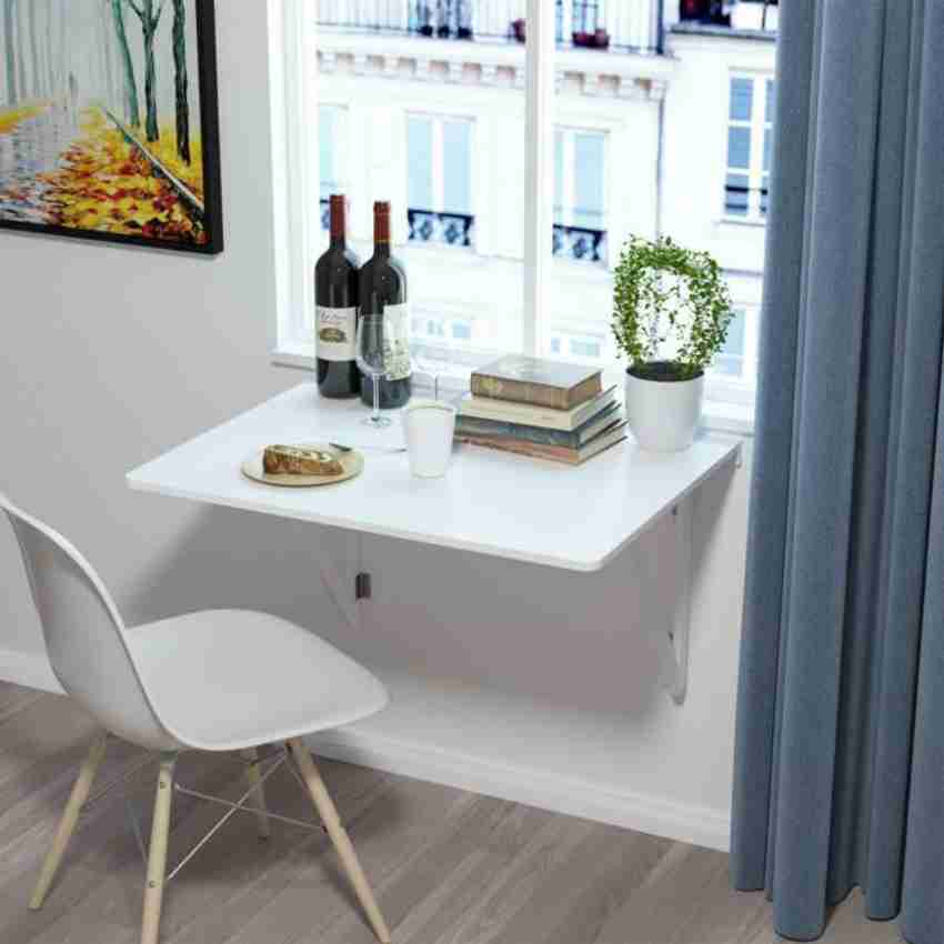 Wall mounted folding glass sales dining table