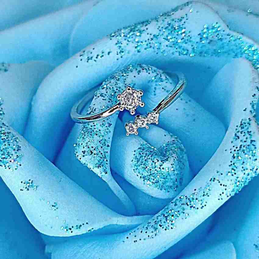 wedding rings aqua blue background