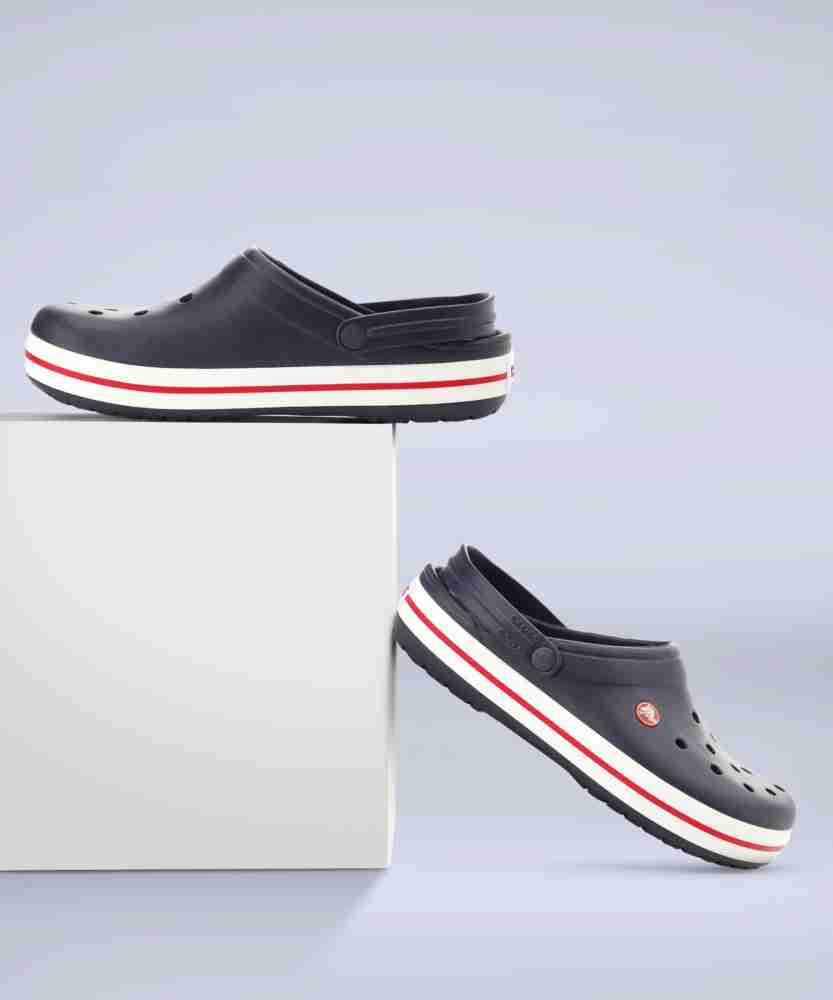 Black crocs with online white stripe