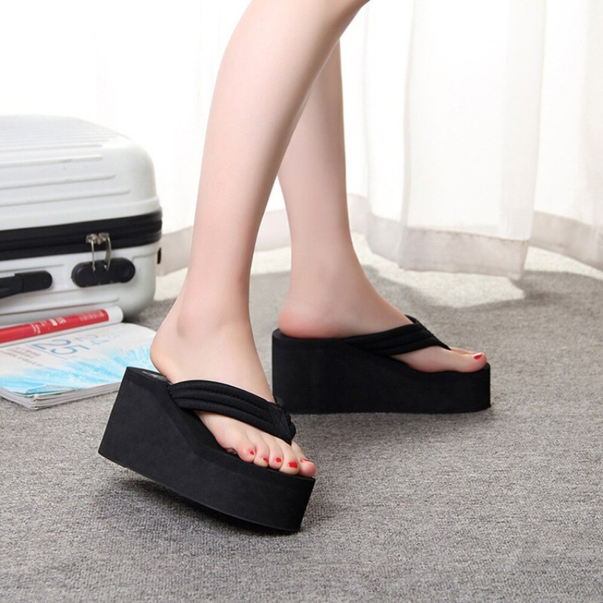 Black wedge best sale flip flops