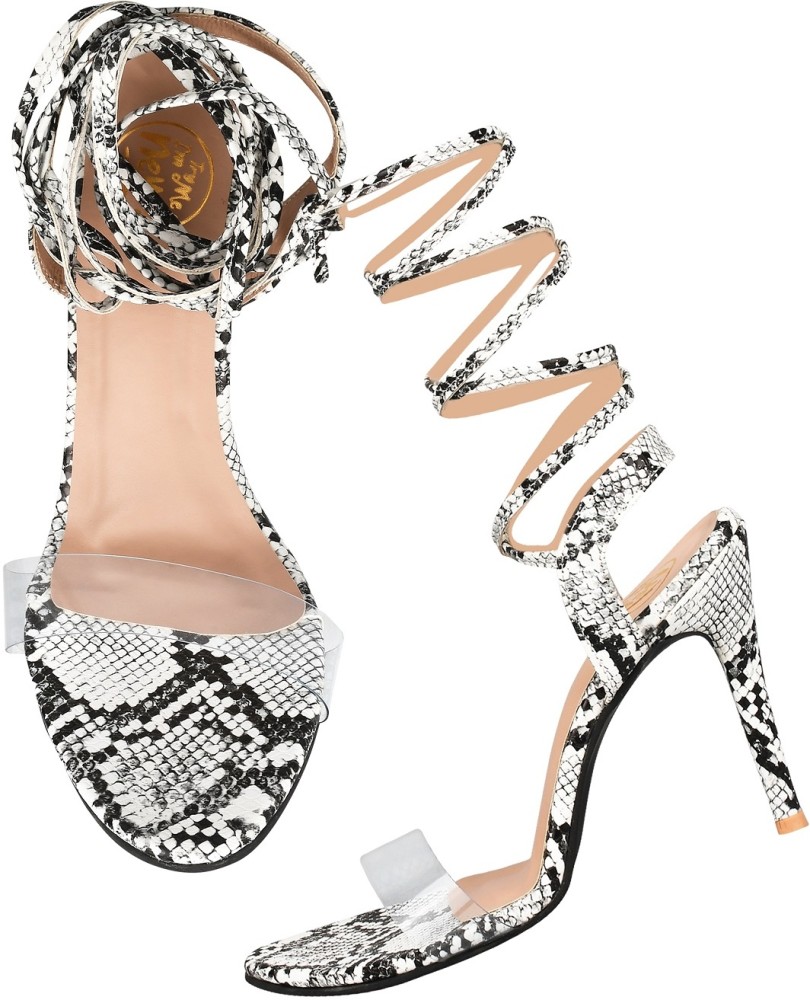 Black and 2025 white snakeskin heels