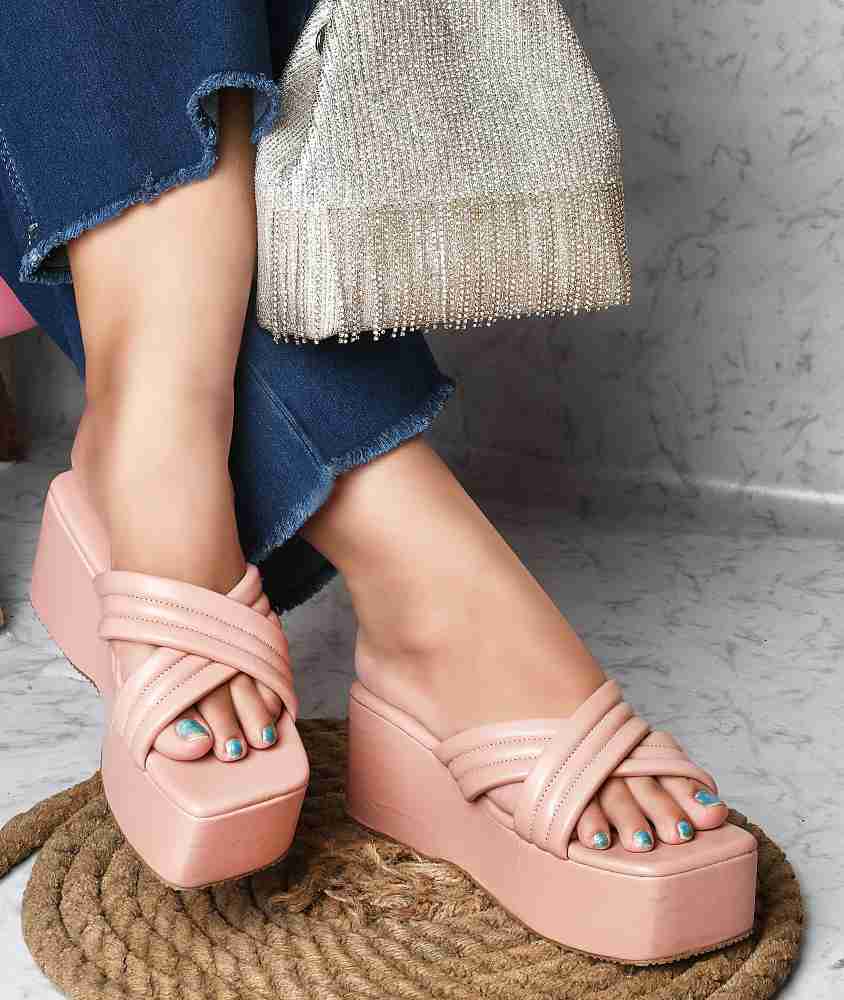 Pink wedge best sale flip flops