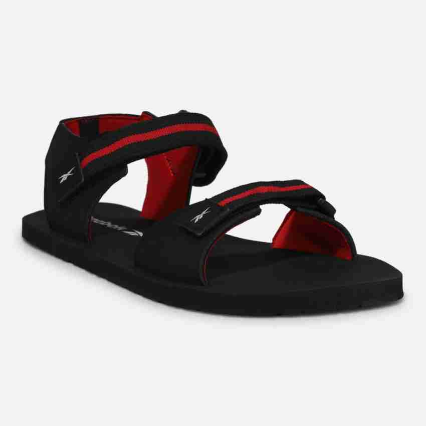 Reebok black flip discount flops