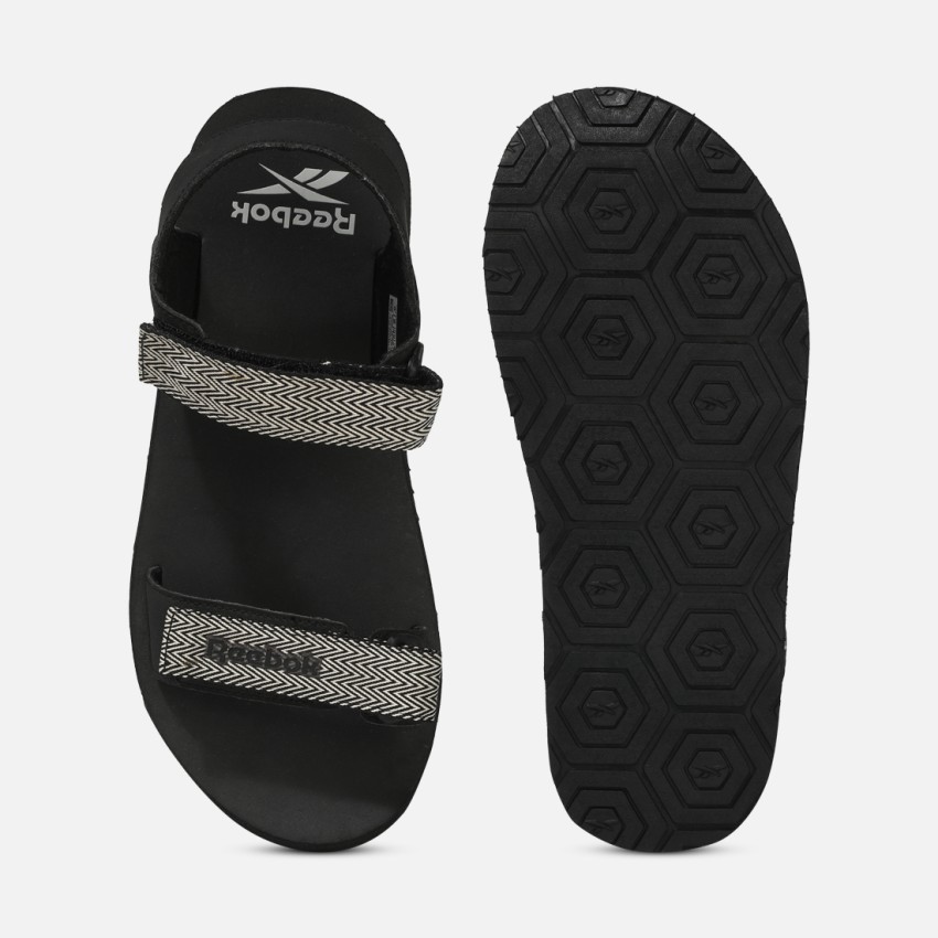 Reebok black 2025 flip flops