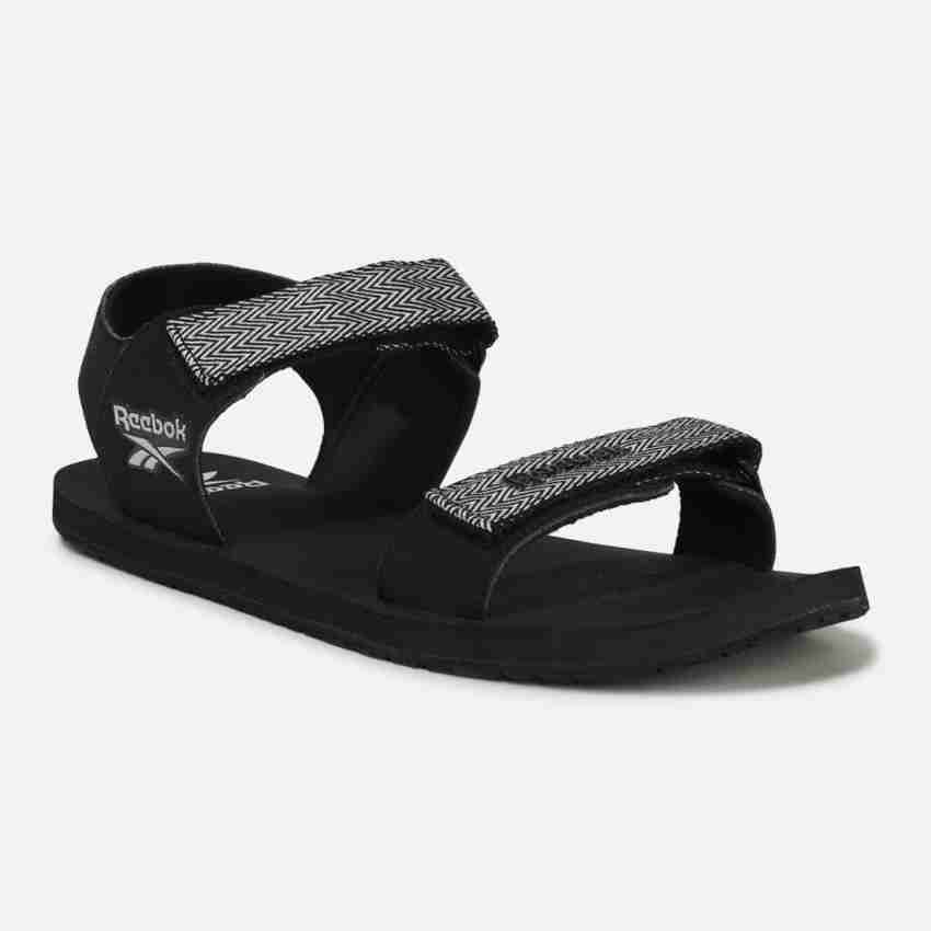 Reebok deals black sandals