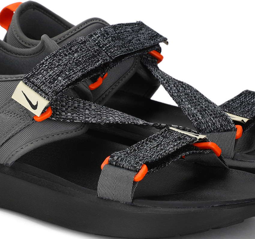 Nike grey store flip flops