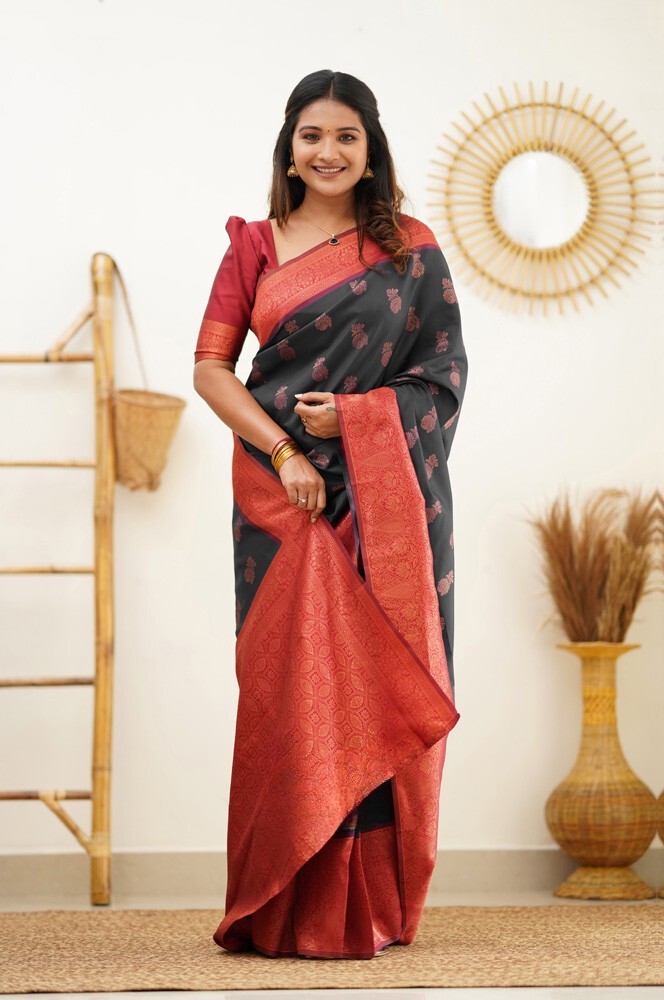 Buy pink kanchi silk saree with black korvai border