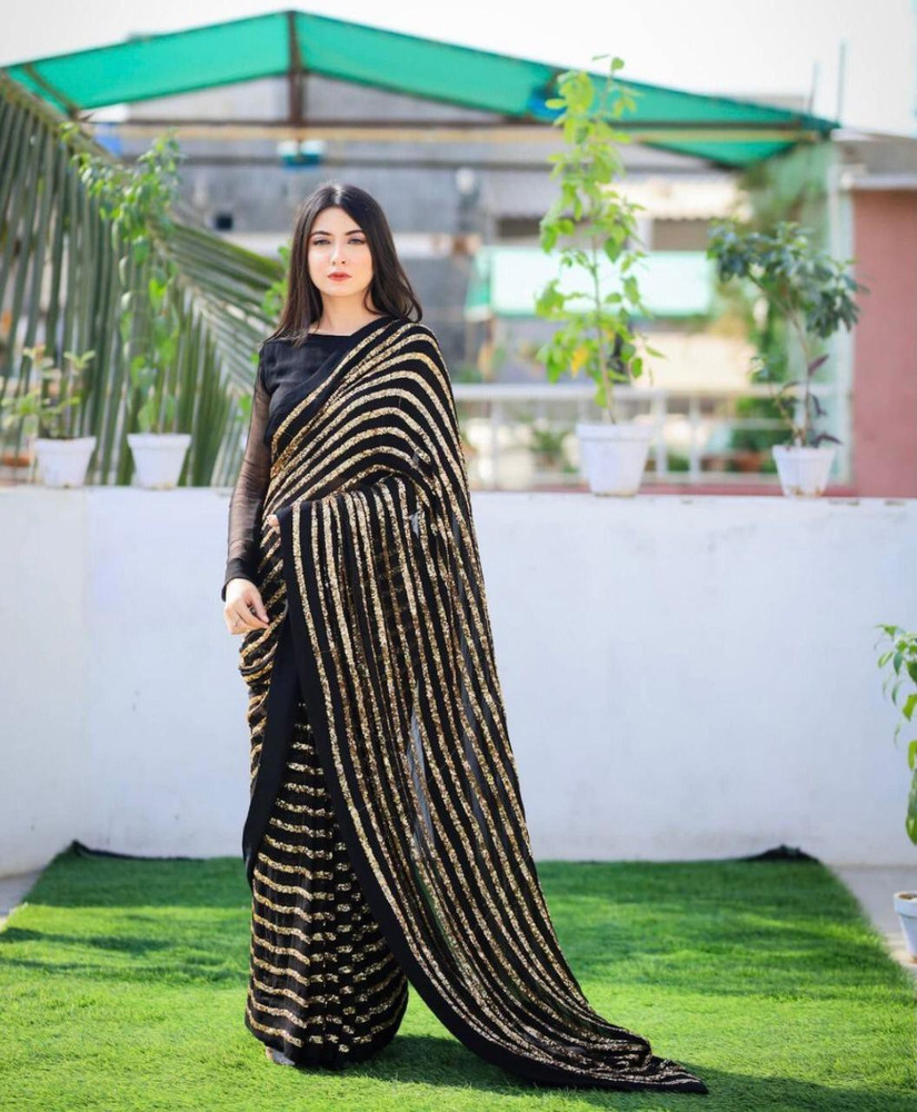 Black saree with top golden border flipkart