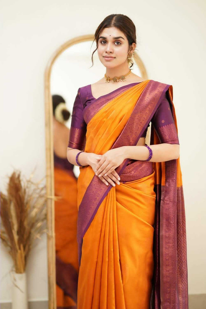 orange saree with violet blouse