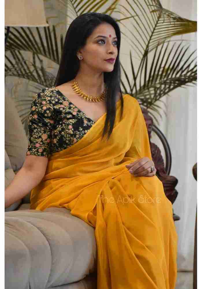 Yellow saree with black blouse online