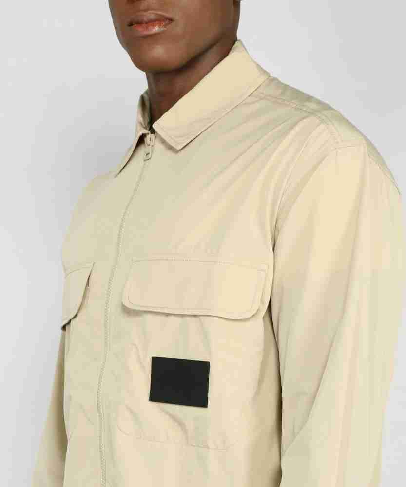 Calvin Klein Jeans Men Solid Casual Beige Shirt - Buy Calvin Klein Jeans  Men Solid Casual Beige Shirt Online at Best Prices in India