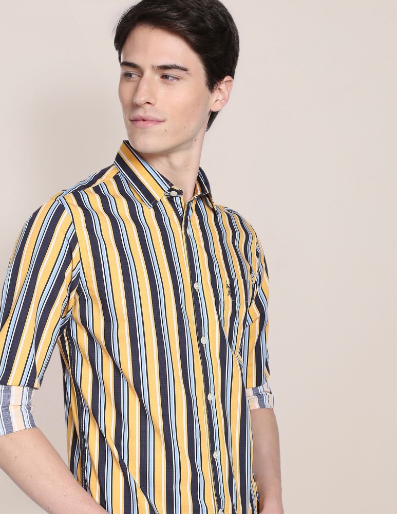 yellow striped polo