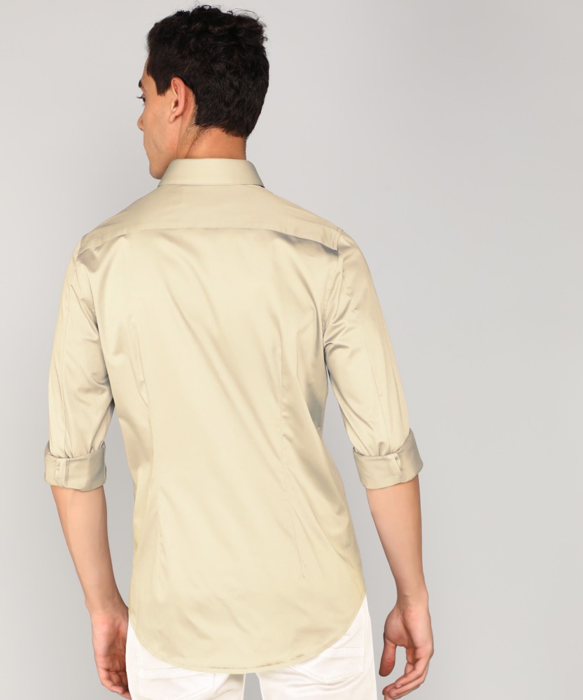 Calvin Klein Jeans Men Solid Casual Beige Shirt - Buy Calvin Klein