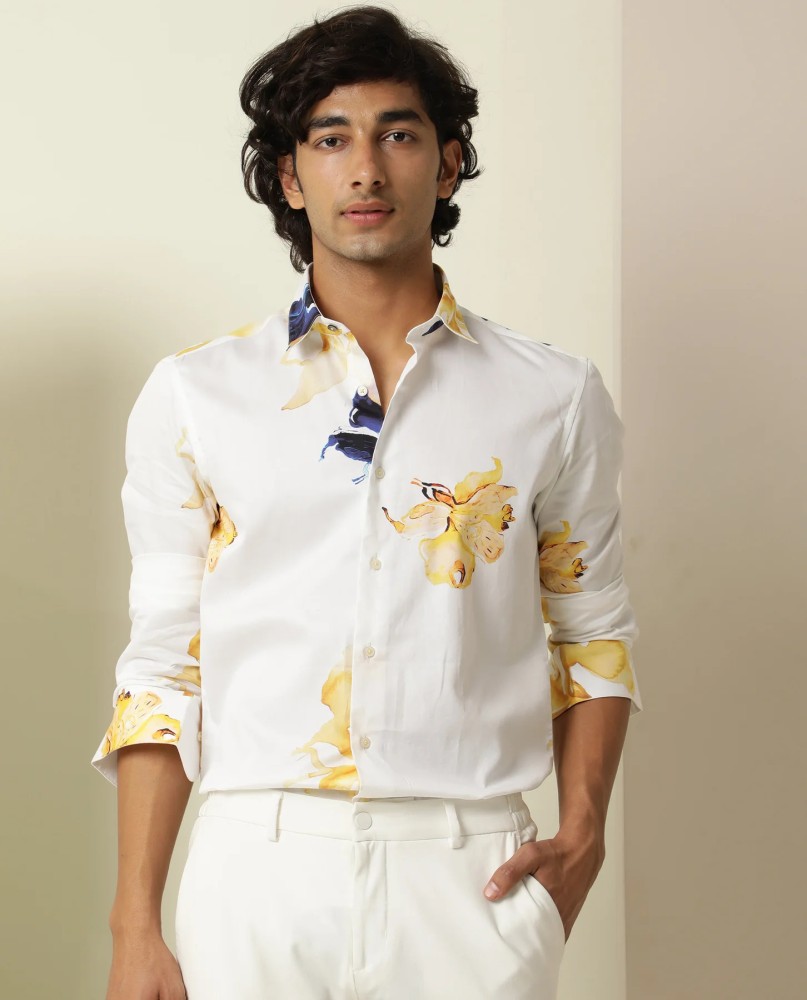 White shirt with store yellow flowers