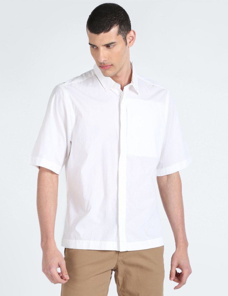 Calvin Klein Jeans Men Solid Casual White Shirt - Buy Calvin Klein Jeans  Men Solid Casual White Shirt Online at Best Prices in India
