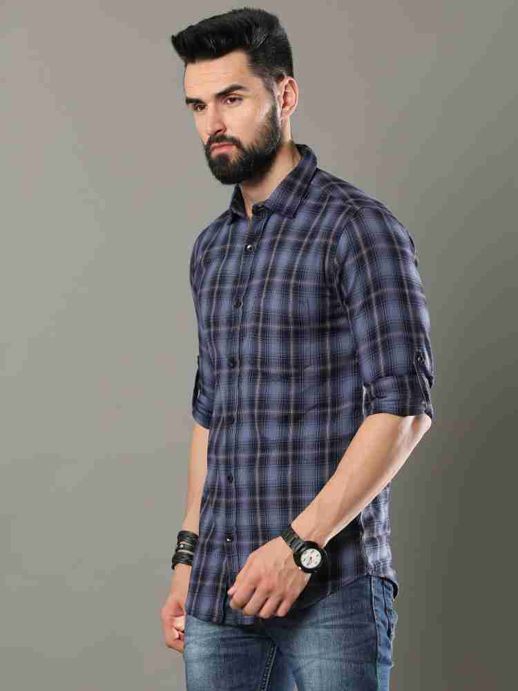 Indian Male Model In Purple Check Shirt And Blue Jeans Stock Photo