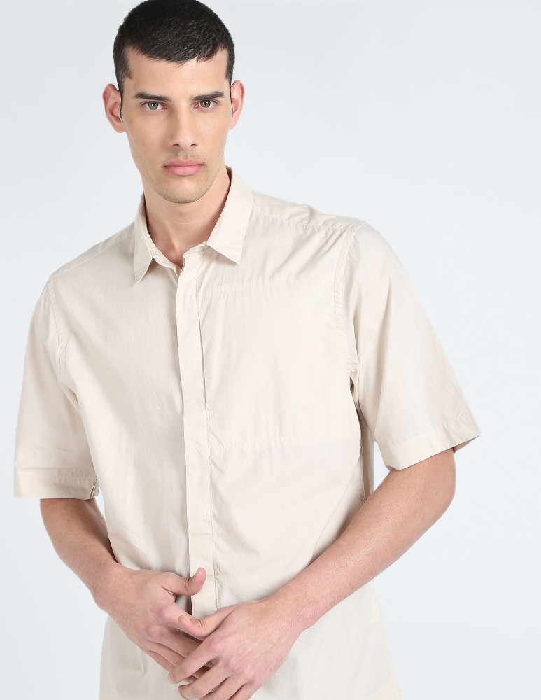 Calvin Klein Jeans Men Solid Casual Beige Shirt - Buy Calvin Klein Jeans  Men Solid Casual Beige Shirt Online at Best Prices in India