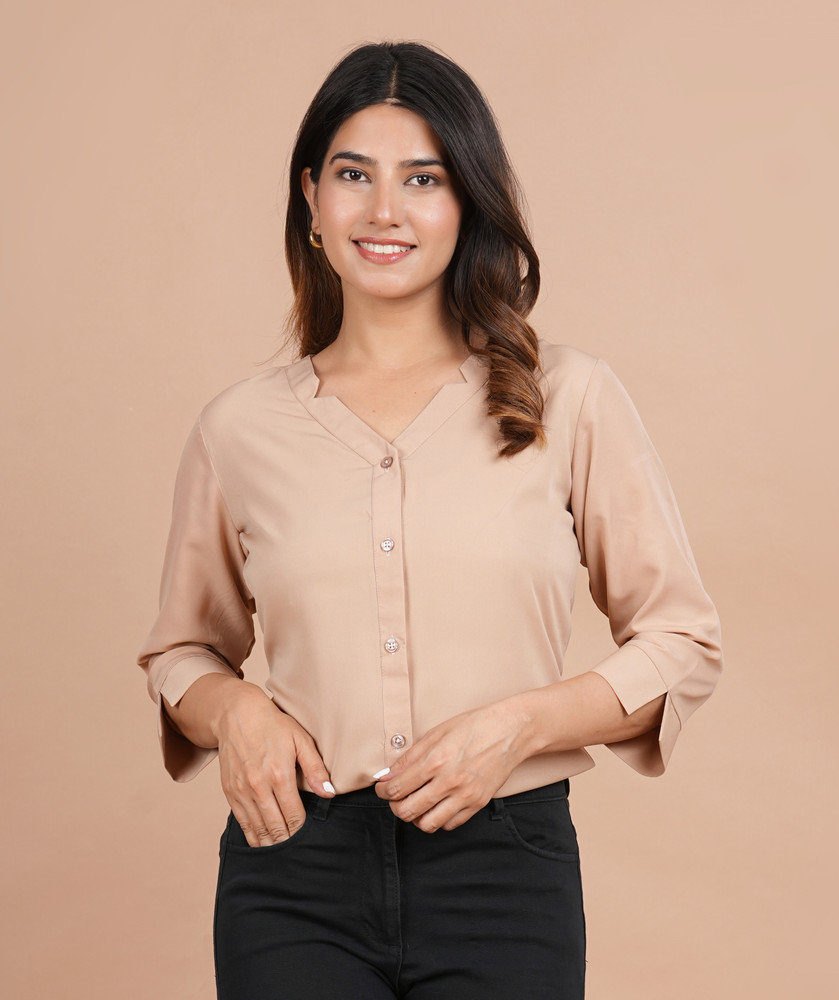 beige color button up shirt