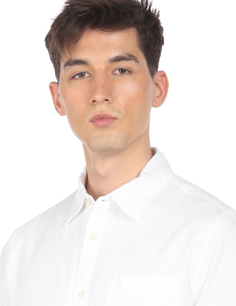 Calvin Klein Jeans Men Solid Casual White Shirt - Buy Calvin Klein Jeans  Men Solid Casual White Shirt Online at Best Prices in India