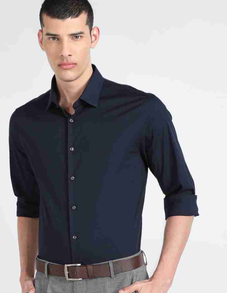 Dark blue shirt and black clearance jeans