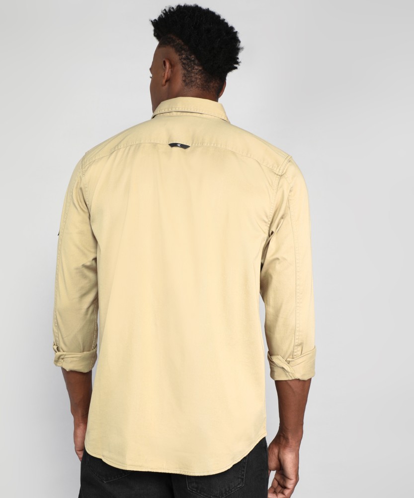 Calvin Klein Jeans Men Solid Casual Beige Shirt - Buy Calvin Klein