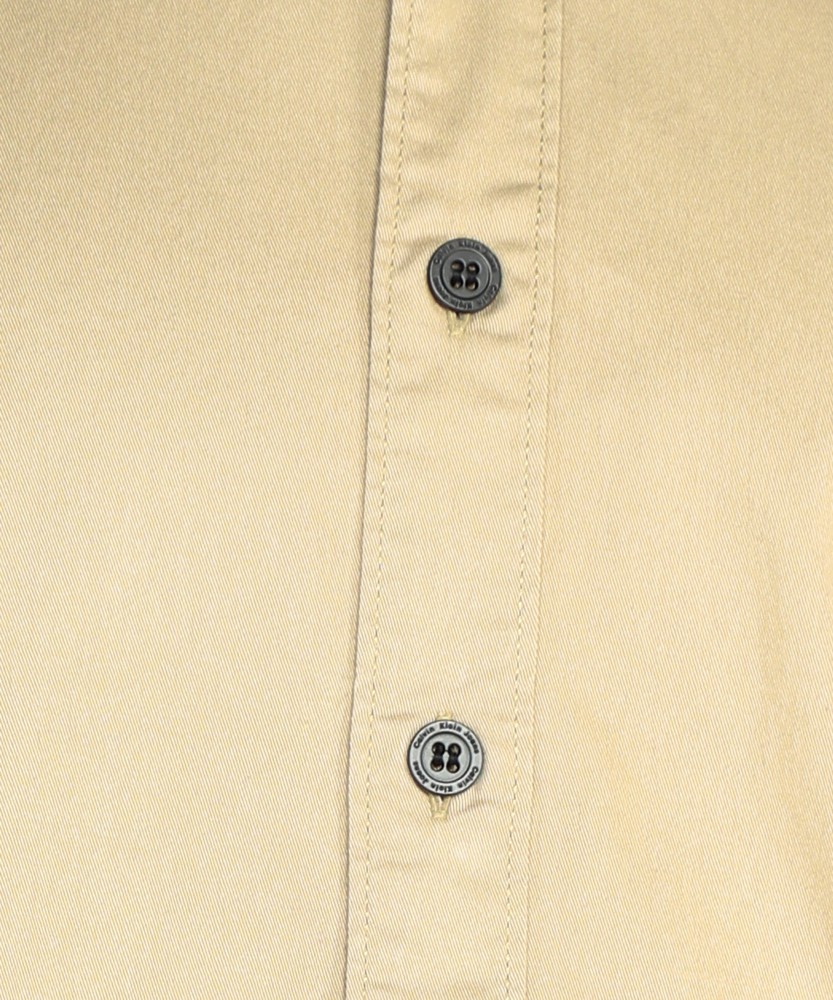 Calvin Klein Jeans Men Solid Casual Beige Shirt - Buy Calvin Klein Jeans  Men Solid Casual Beige Shirt Online at Best Prices in India