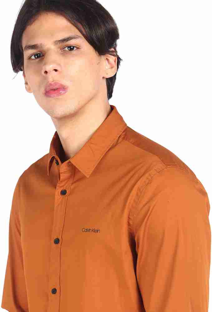 Calvin klein orange best sale shirt