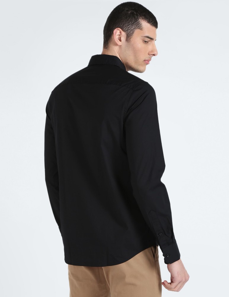 Calvin Klein Jeans Black Solid Slim Fit Casual Shirt 7200737.htm - Buy Calvin  Klein Jeans Black Solid Slim Fit Casual Shirt 7200737.htm online in India