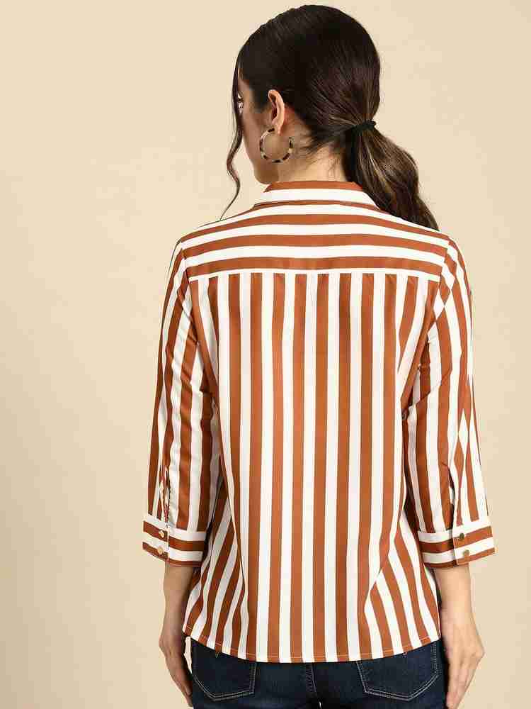 women's brown and white striped shirt