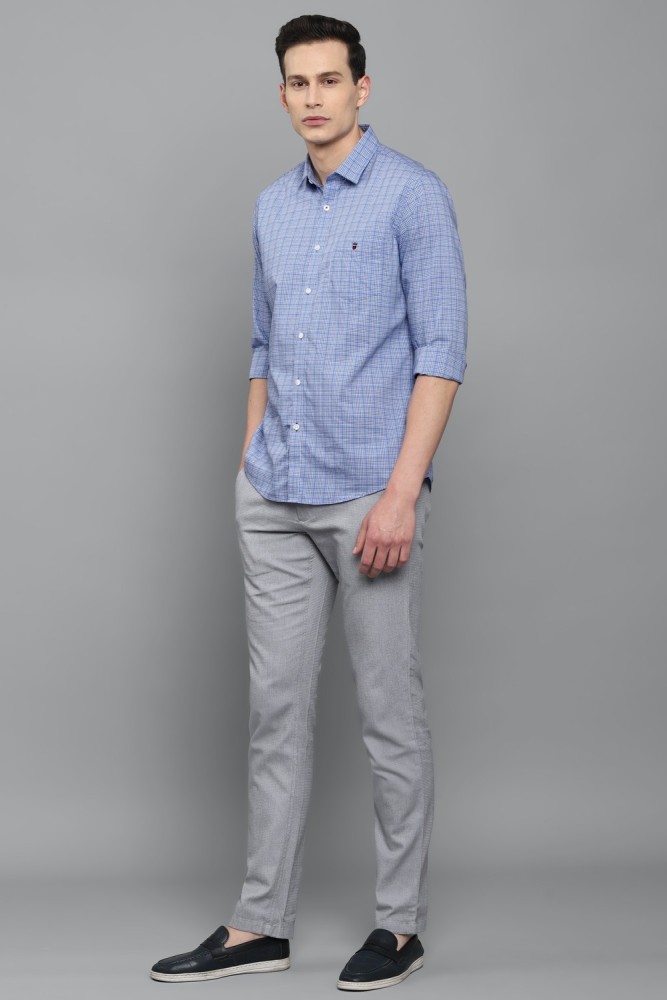 dark grey pants with blue shirt