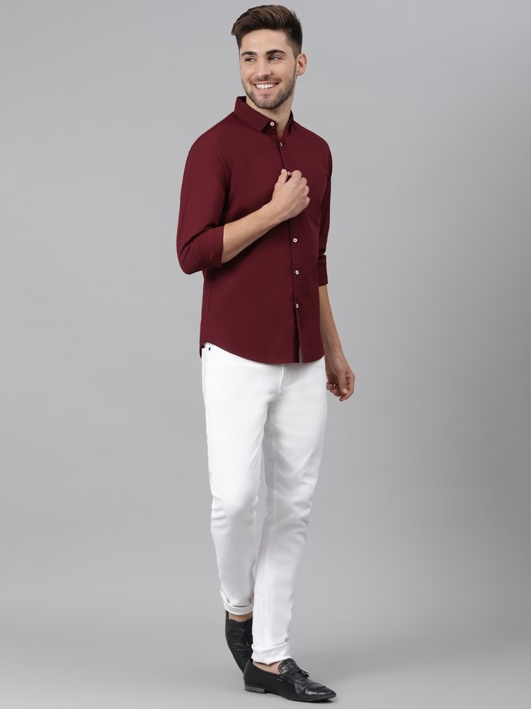 maroon shirt white pants