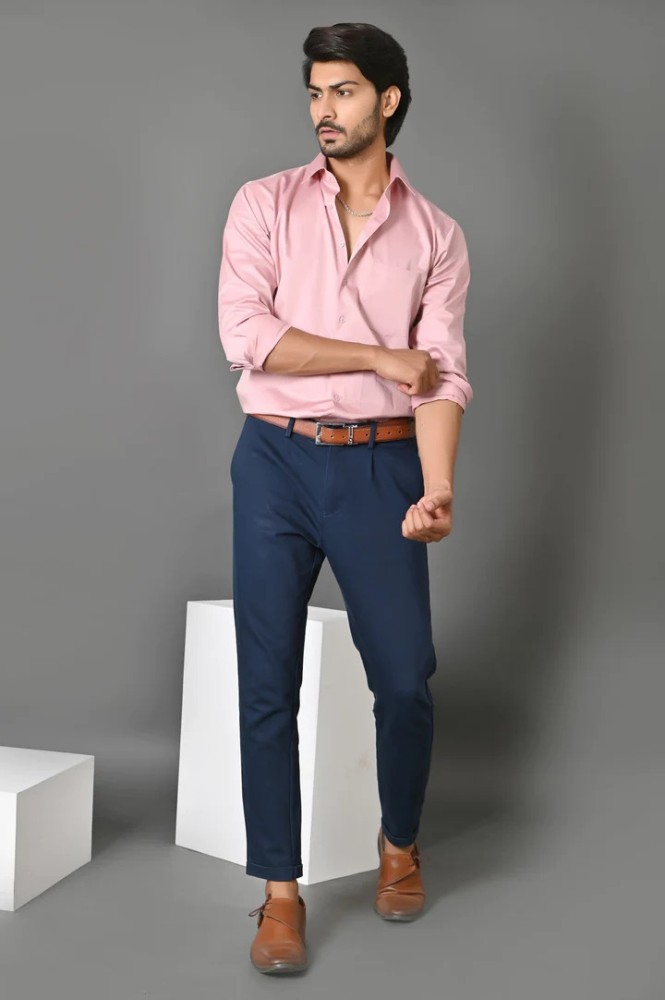 Pink shirt store dark blue pants