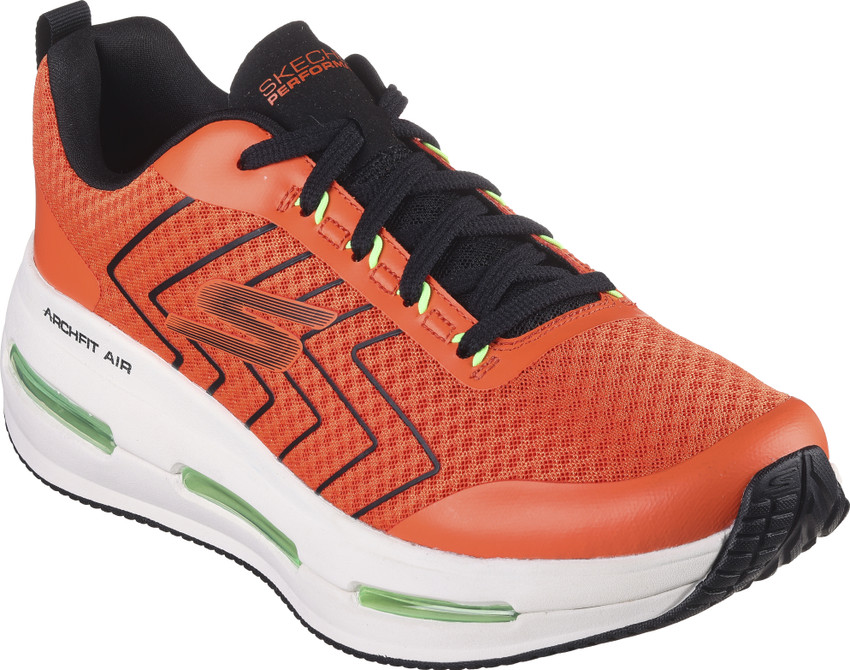 Orange skechers sales