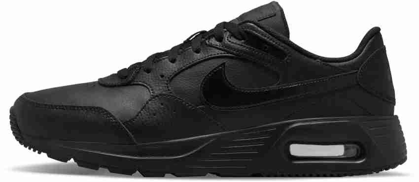 Nike leather hot sale black trainers