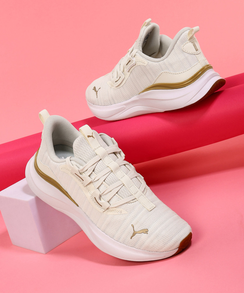 white gold and pink pumas